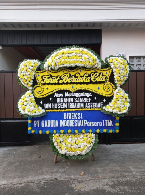 Papan Bunga Duka di Rurukan Satu