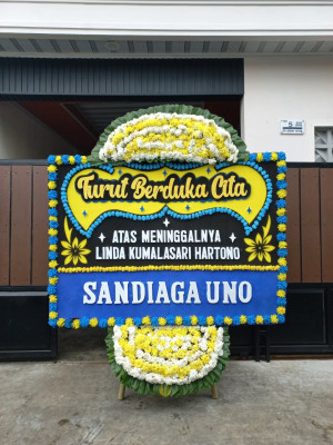 Papan Bunga Duka di Rurukan Satu