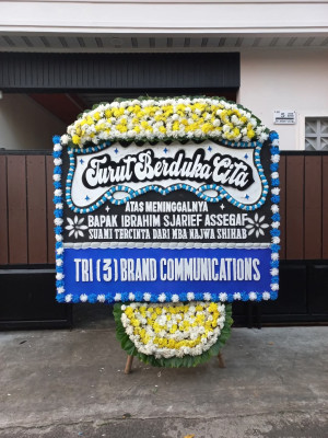 Papan Bunga Duka di Rurukan Satu